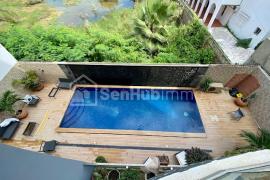 Appartement luxueux avec piscine et salle de sport